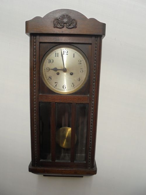 Eight Day Oak Bevelled Door Wall Clock