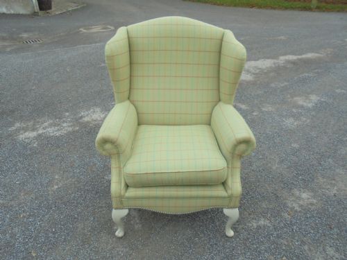 Upholstered Winged Armchair