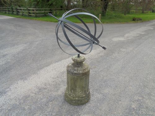 Armillary Sphere Standing on a Weathered Stone Base