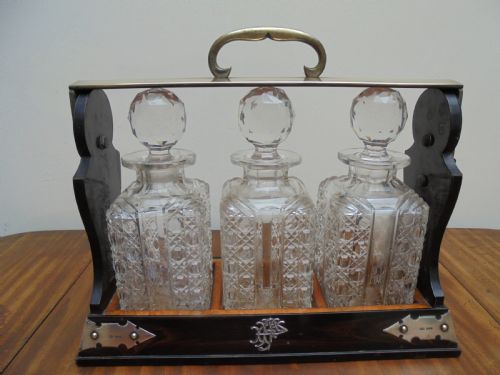 Betjemanns Coromandel Tantalus Three Bottle Silver Mounted