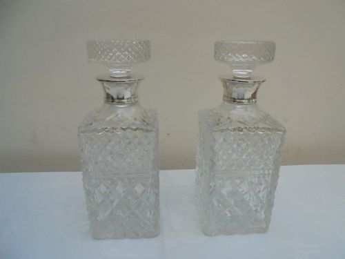 Pair of Cut Glass, Silver Top Square Decanters.