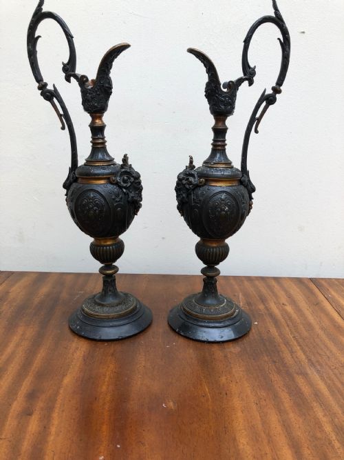 Pair of Bronze Ewers with Gilded Banding