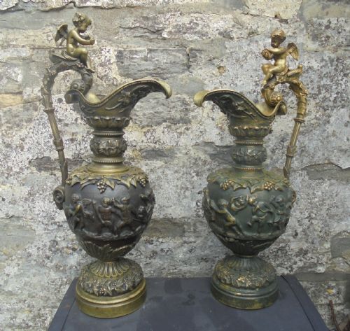 Large Pair 19th Century Bronze Ewers with Cherubs