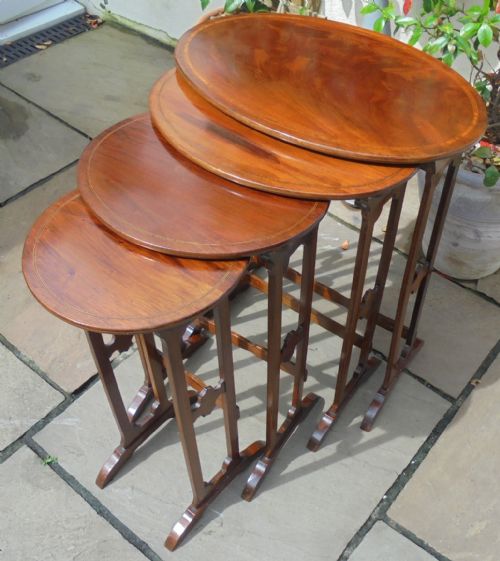 Nest of Four Oval  Inlaid Mahogany  Occasional Lamp Tables