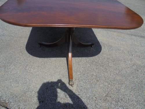 fig 1. Three pillar mahogany dining table seats fourteen plus