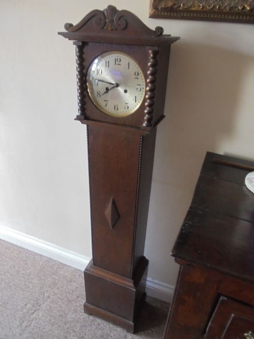 
Oak Grandmother Clock Striking on Four Bars