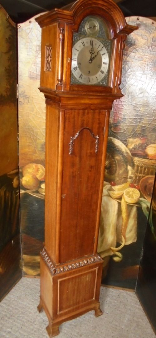 Walnut  Grandmother Clock. Brass Face and Chiming