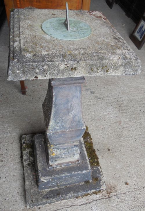 Sun Dial on Well Weathered Stand