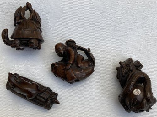 Collection of  Four Wooden Netsuke Depicting Animals