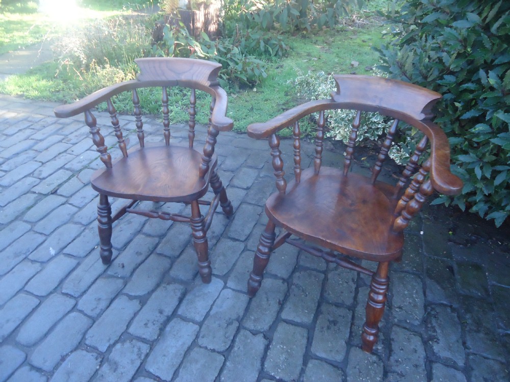 Pair of late 19th century smokers bow armchairs