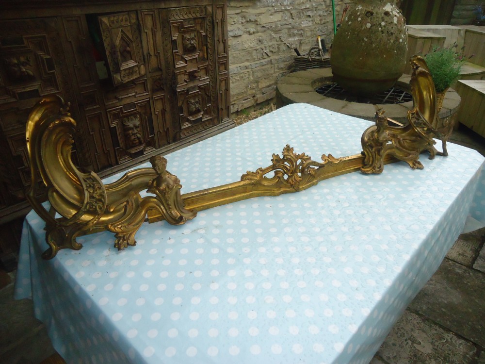 French Rococo extending gilded brass fender