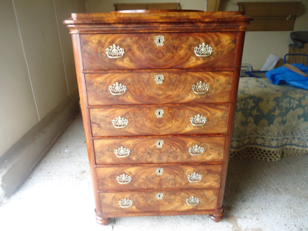 Flame mahogany chest of six drawers