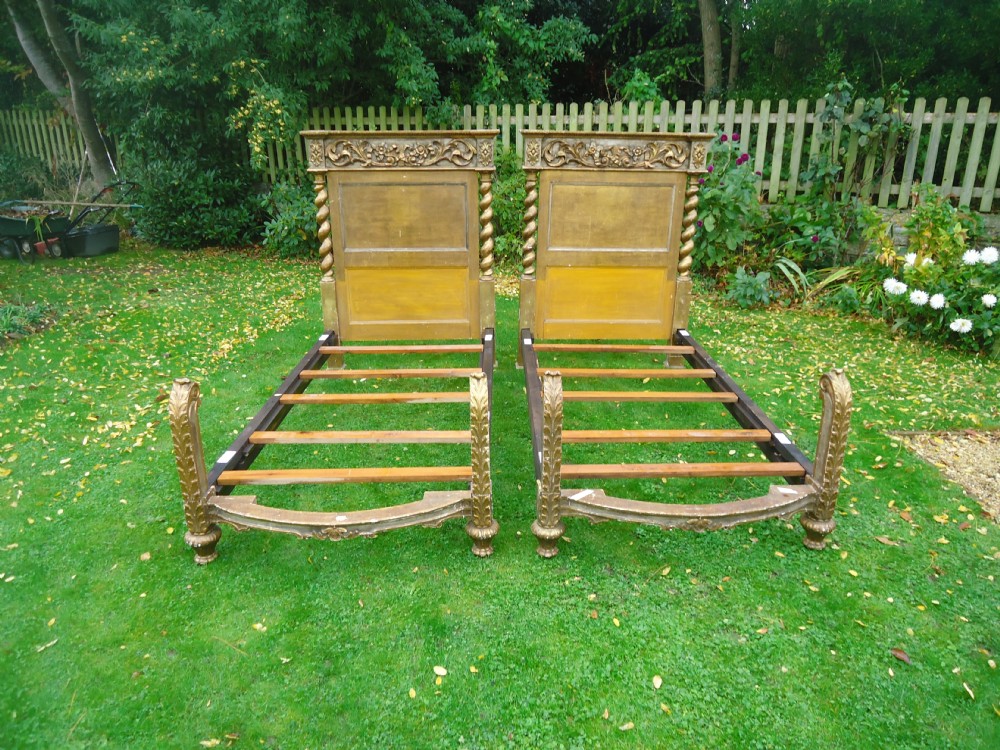 Pair of 19th century French gilded distressed single beds