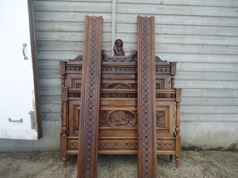 Heavily carved Breton French 57 ins wide chestnut wood bed