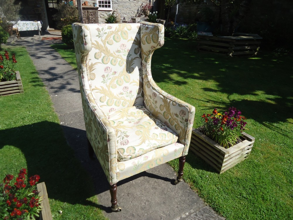 A genuine 18th century wing armchair