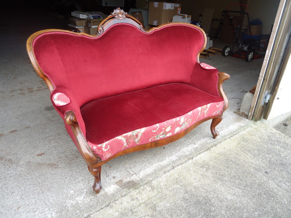 Ornate mahogany framed two seater sofa