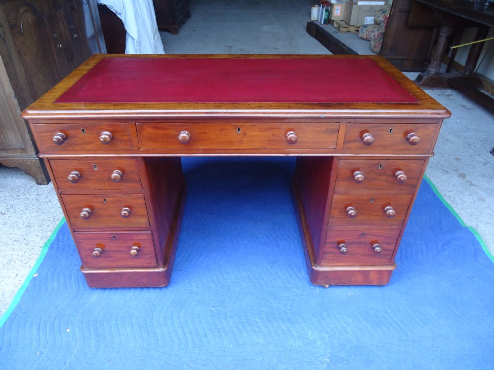 Mahogany 19th century leather top pedestal desk