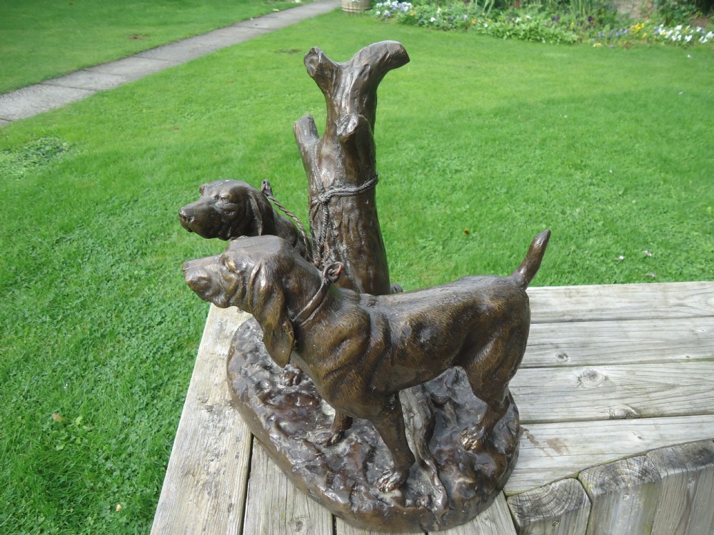 Bronze figure of two dogs.
