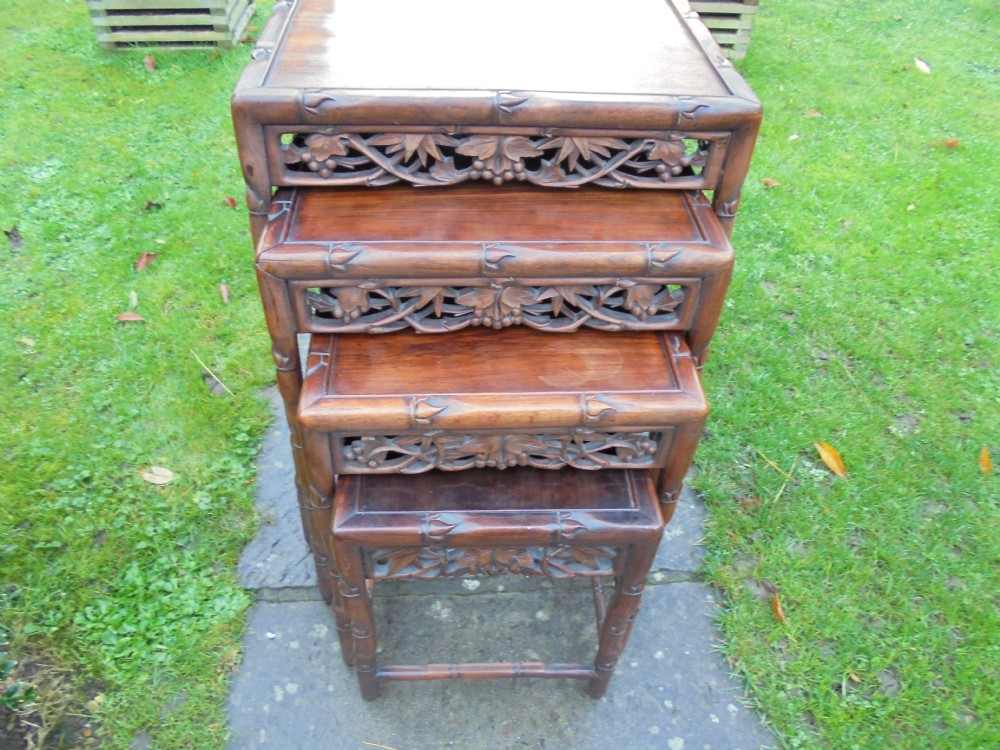 Nest of four Chinese hardwood tables