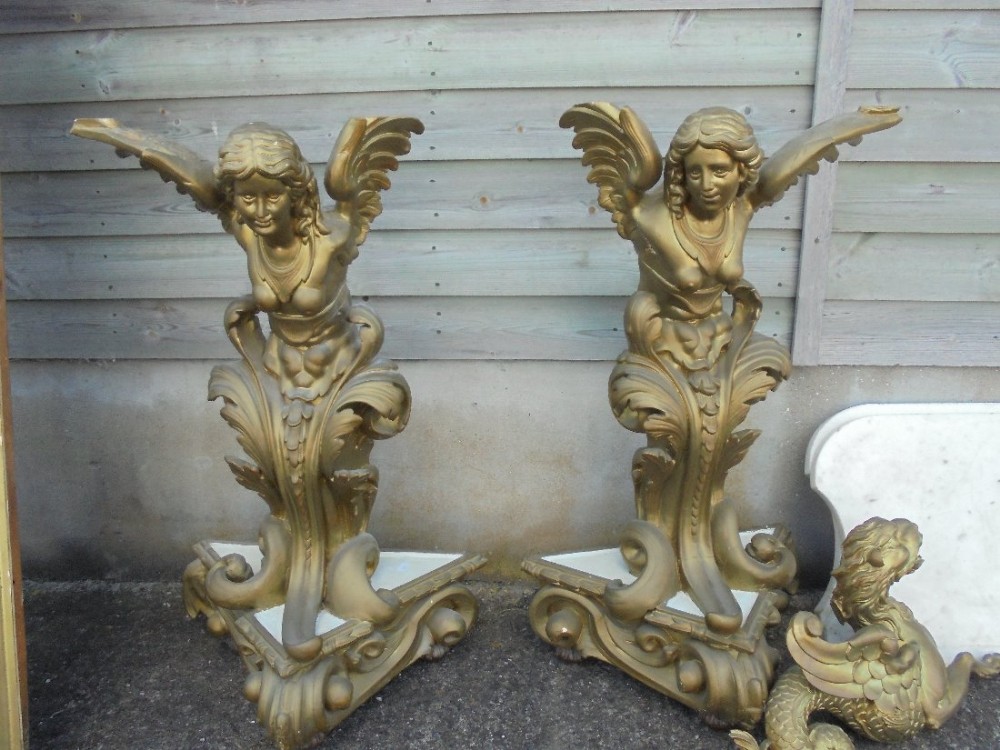 Pair of French or Italian gilded marble top console tables and mirrors
