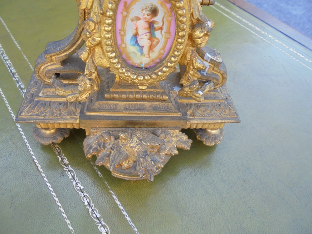 Pair of 19th century gilded bronze candelabra  with Sevres plaques View II