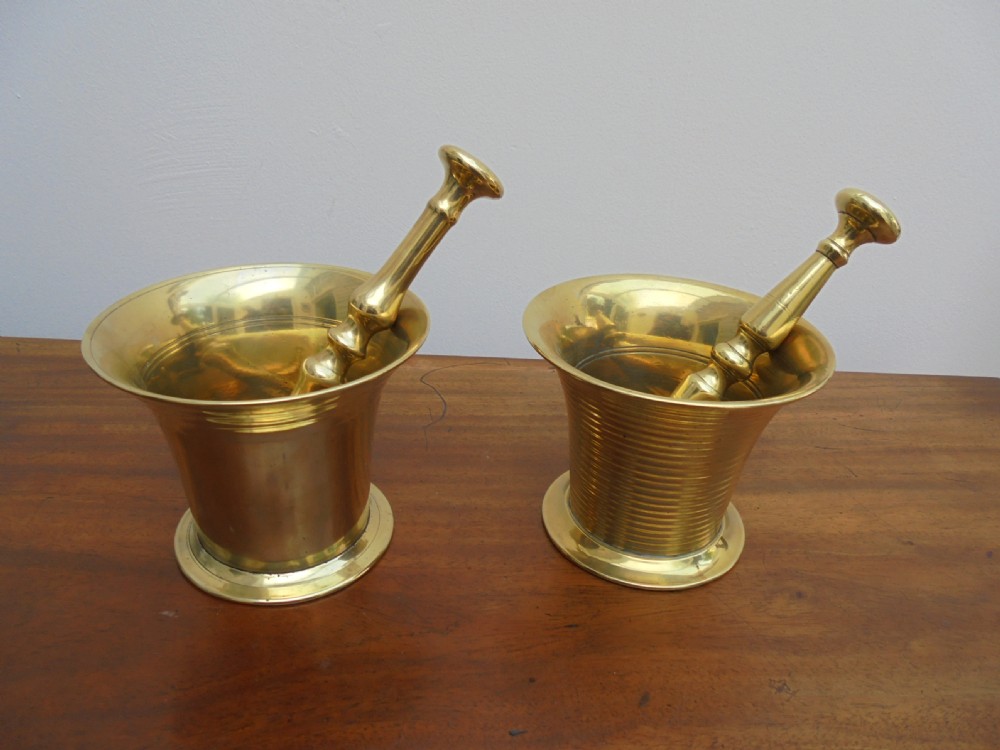 Two 19th century brass pestles and mortars