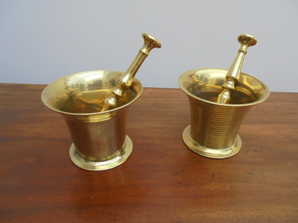 Two 19th century brass pestles and mortars View II