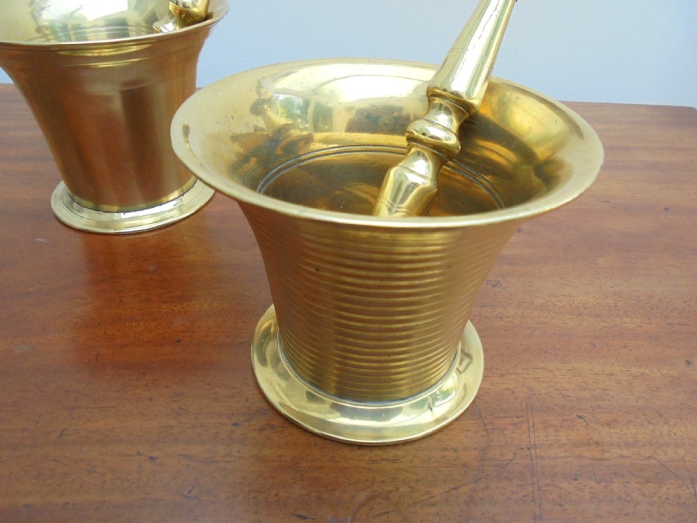 Two 19th century brass pestles and mortars View III