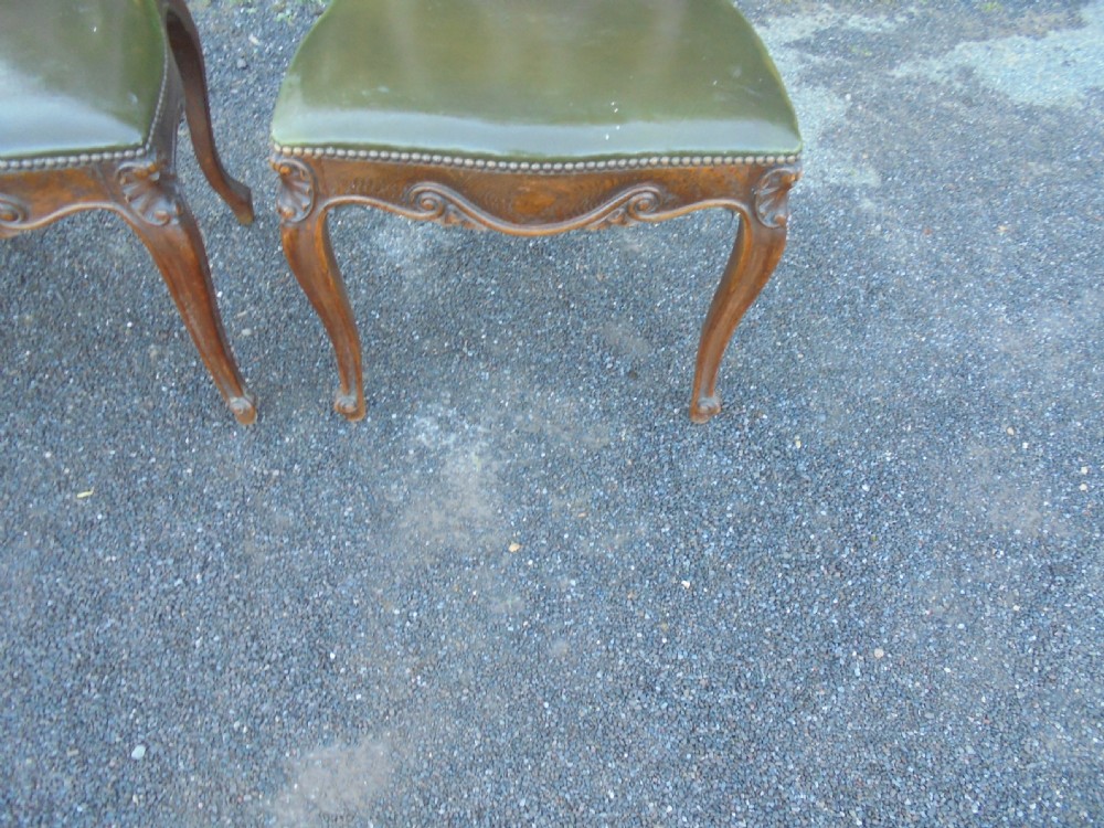 Set of six French carved oak dining chairs with leather seats and high back View IV