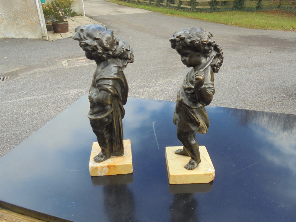 Pair 19th century bronze boy and girl figures View III