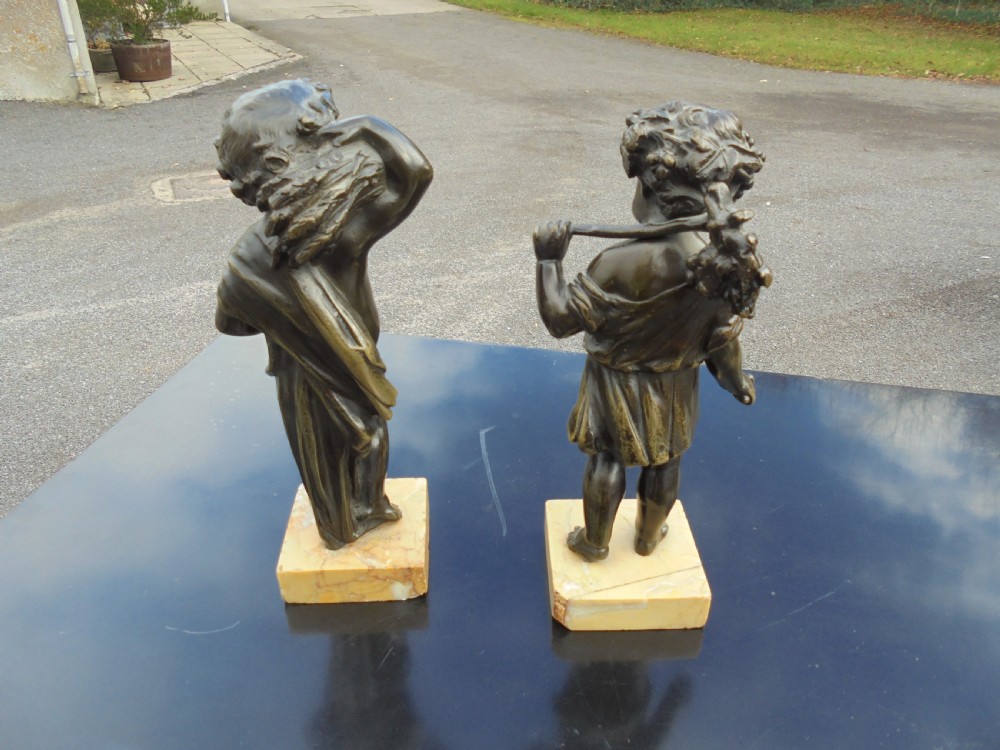 Pair 19th century bronze boy and girl figures View IV