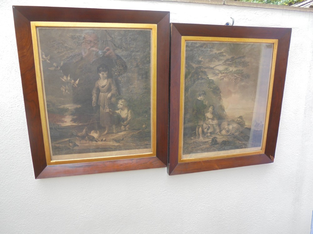 Pair of Victorian prints in rosewood frames