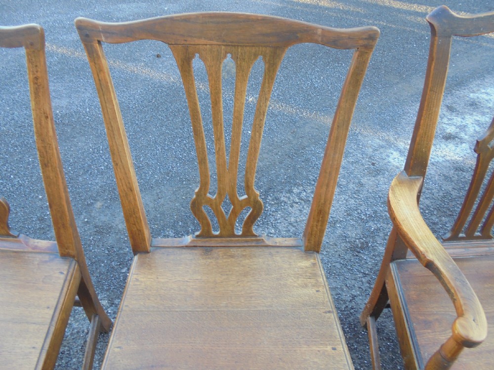 Set of Set of six plus one George 111 oak and elm dining chairs View XI