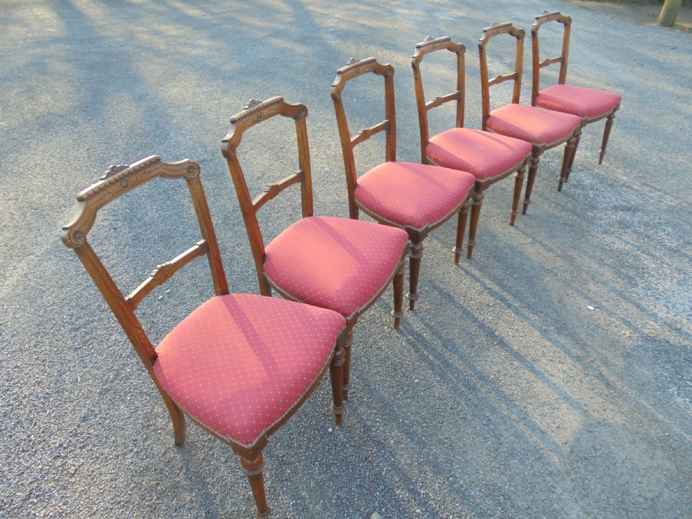 Set of six Victorian walnut dining chairs View V