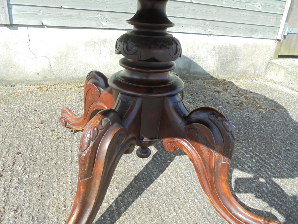Victorian shaped walnut loo table View VI