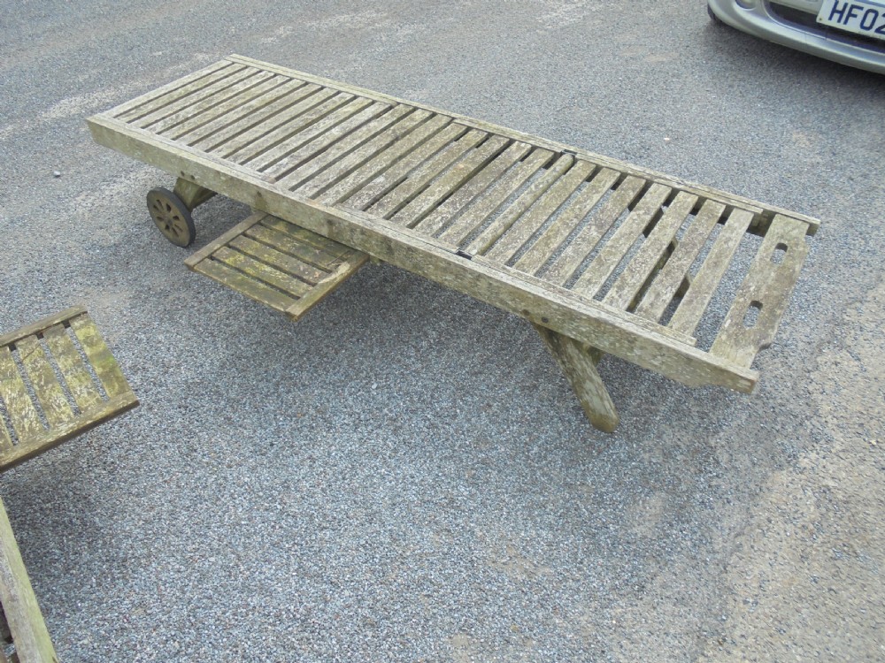 Pair  of wooden reclining garden loungers View II