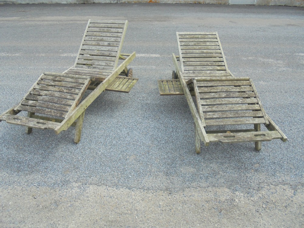 Pair  of wooden reclining garden loungers View III