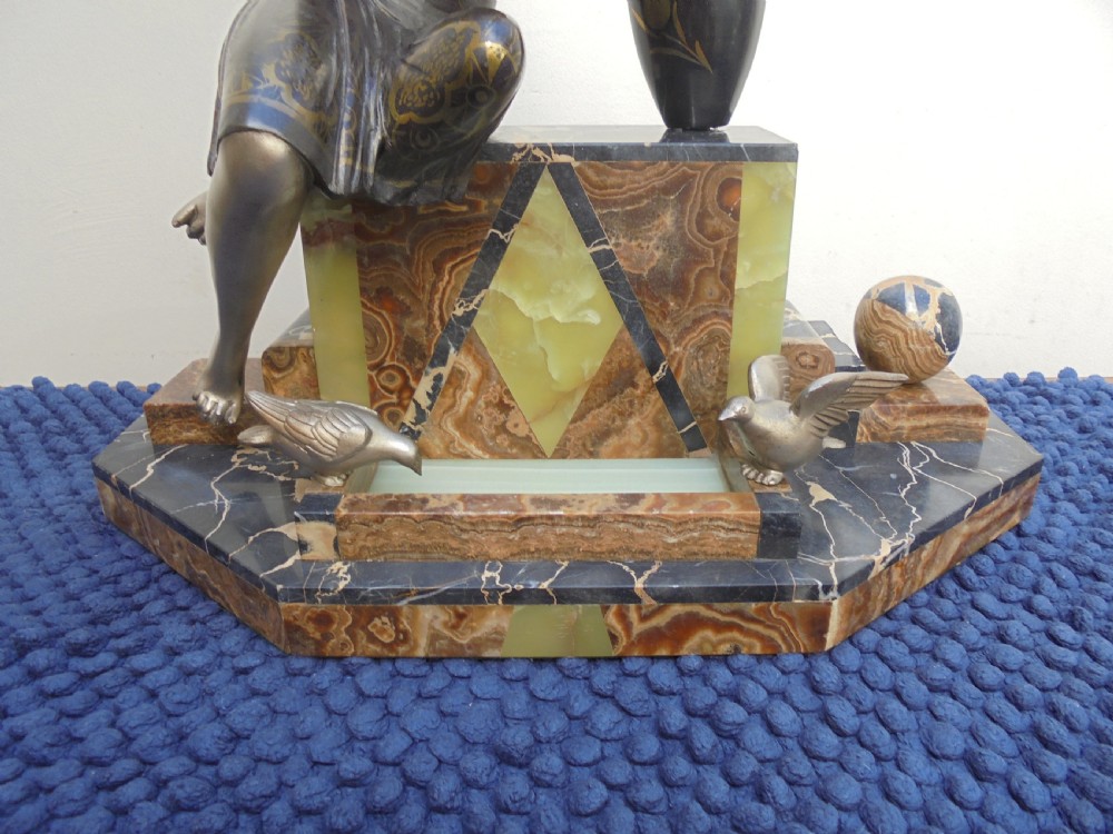 Art Deco figure of young girl feeding the birds View II