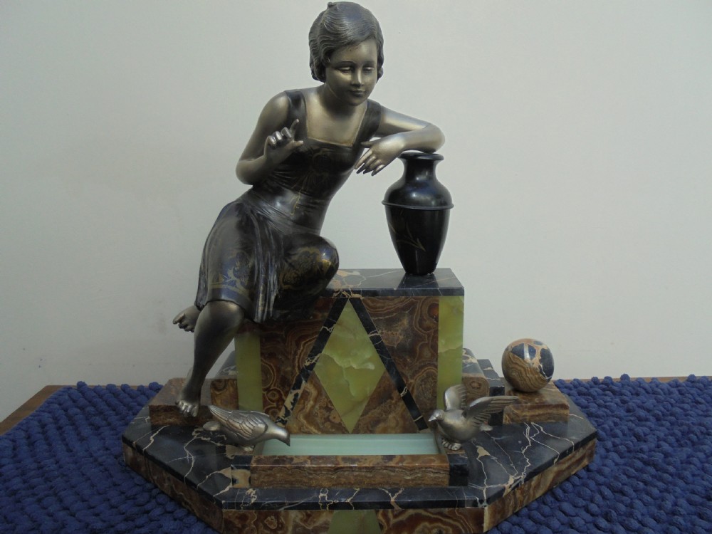 Art Deco figure of young girl feeding the birds View III