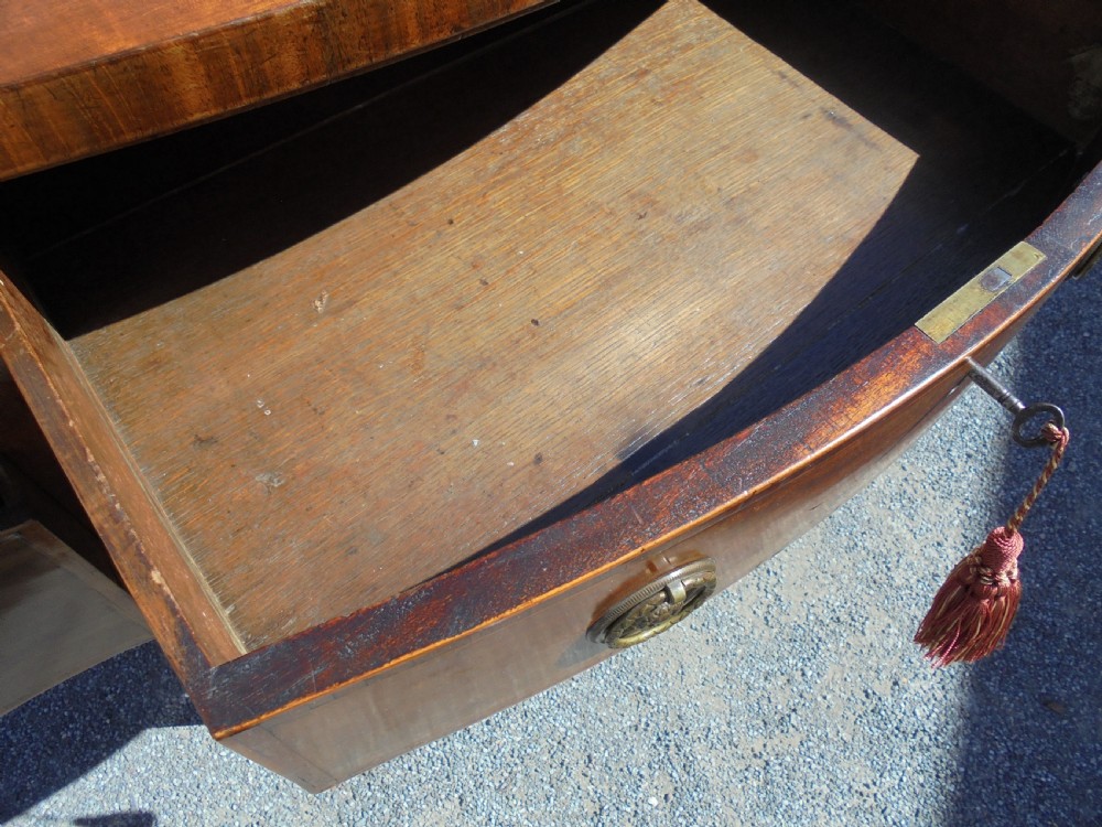 Classic 18th century mahogany serpentine sideboard View II