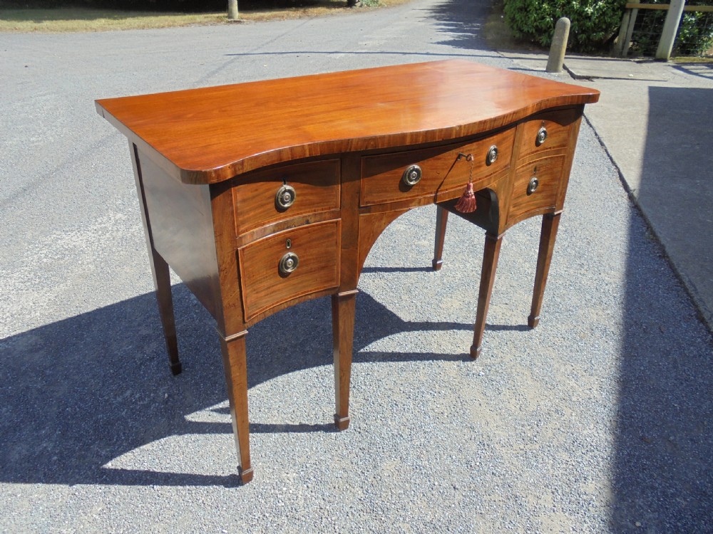 Classic 18th century mahogany serpentine sideboard View III