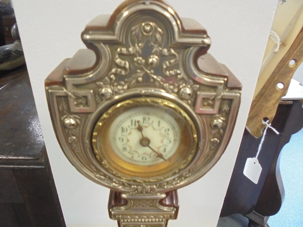 Silver Art Nouveau miniature clock . Hall marked View III