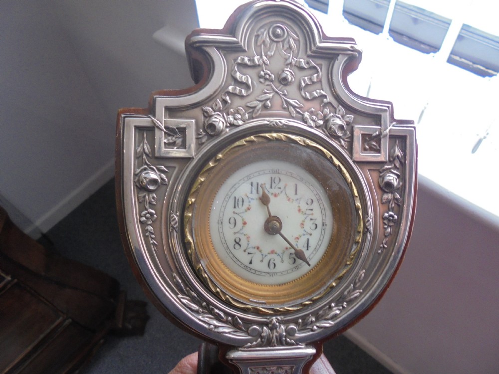 Silver Art Nouveau miniature clock . Hall marked View VI