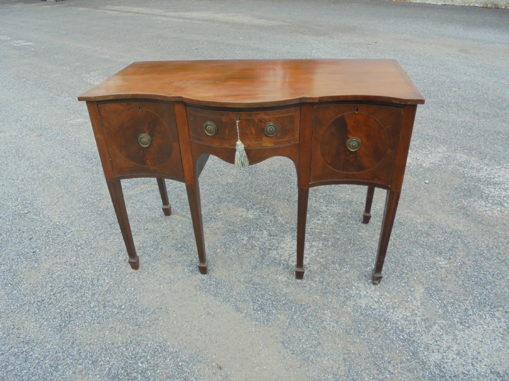 19th century serpentine Sheraton style sideboard