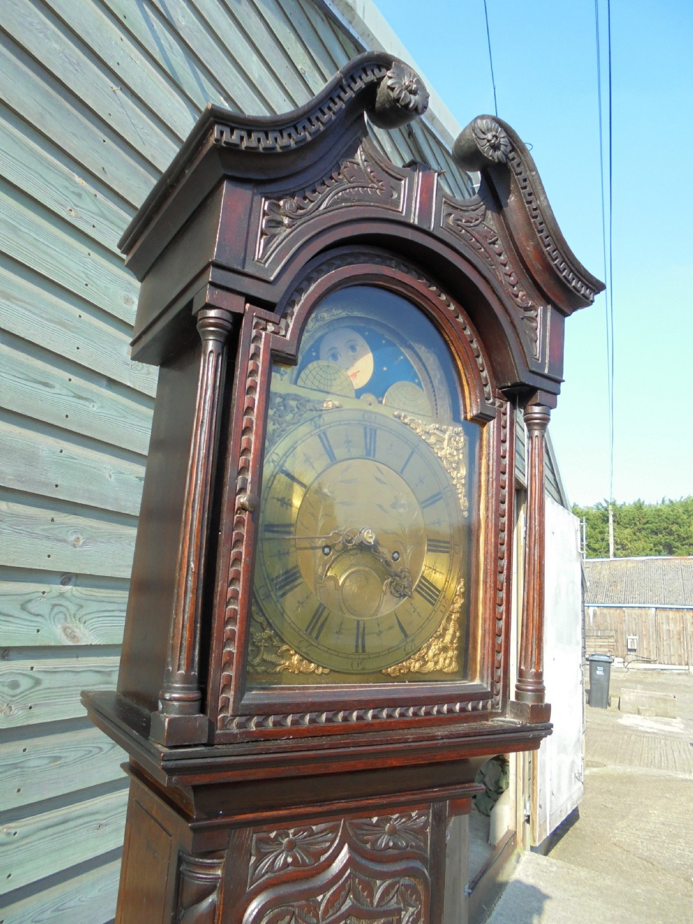 Late 18th century brass face carved oak Grandfather long case clock View IX