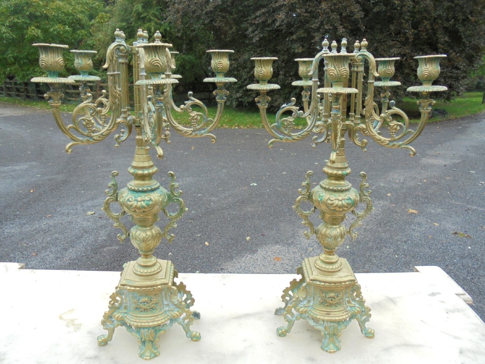 Pair of  French brass five branch candelabra 