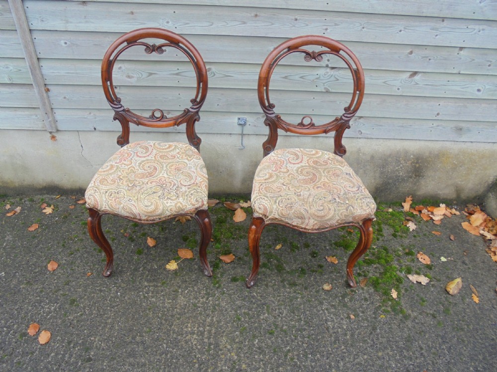 Pair of Victorian walnut balloon back dining chairs