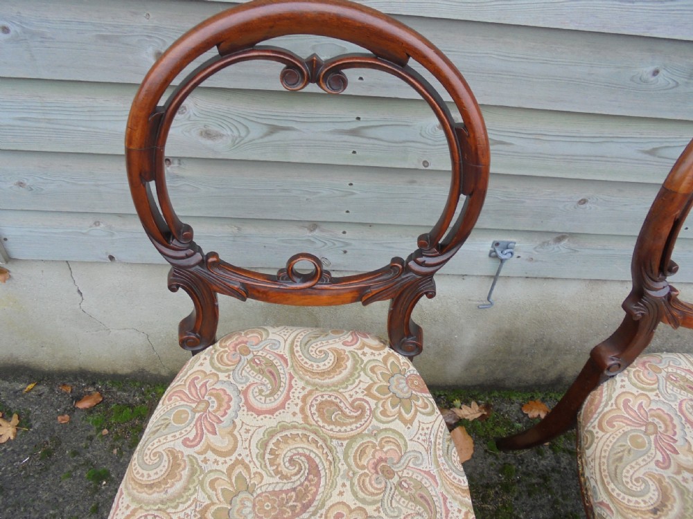 Pair of Victorian walnut balloon back dining chairs View III
