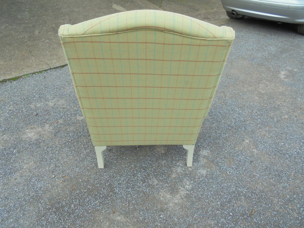 Upholstered winged armchair View IV