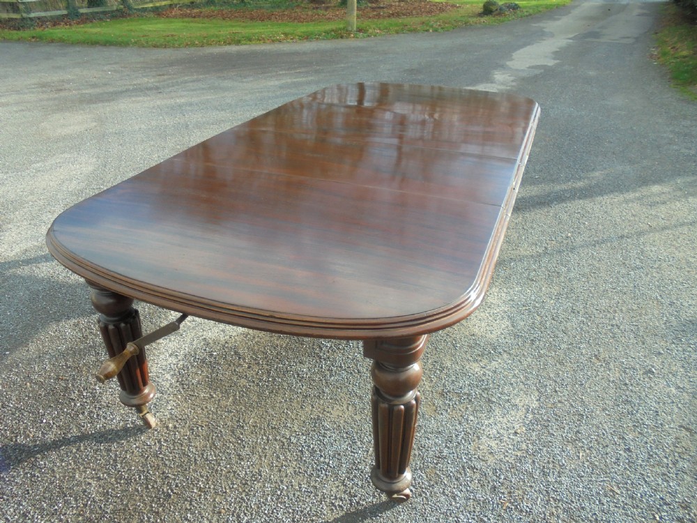 19th century mahogany two leaf extending dining table Seats ten View V